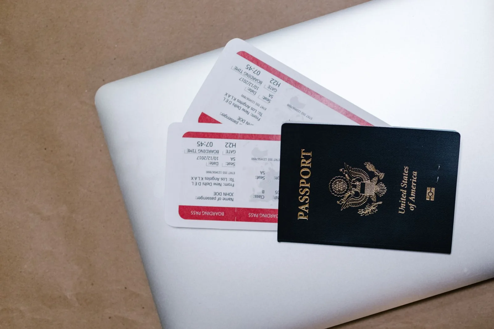 Airline ticket insurance cost breakdown showing traveler reviewing a travel insurance policy at a check-in counter